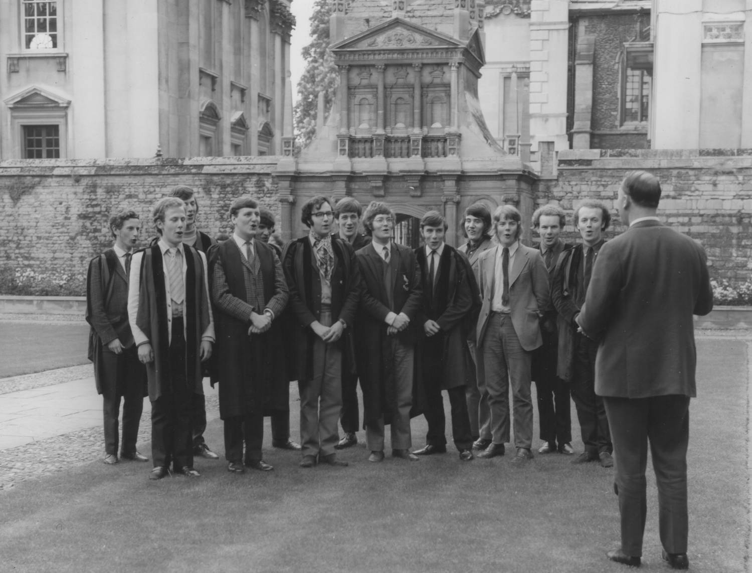 The Choir of Gonville & Caius College, with the Precentor Peter Tranchell, in Caius Court, 1971